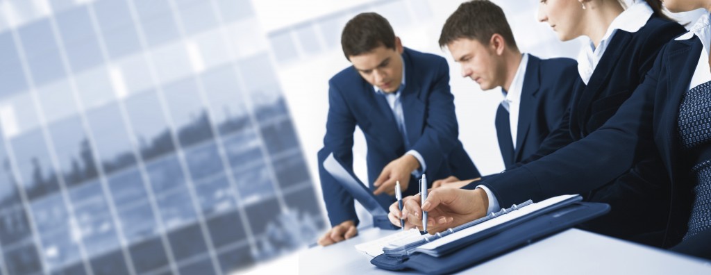 Contemporary business people working in team in the office